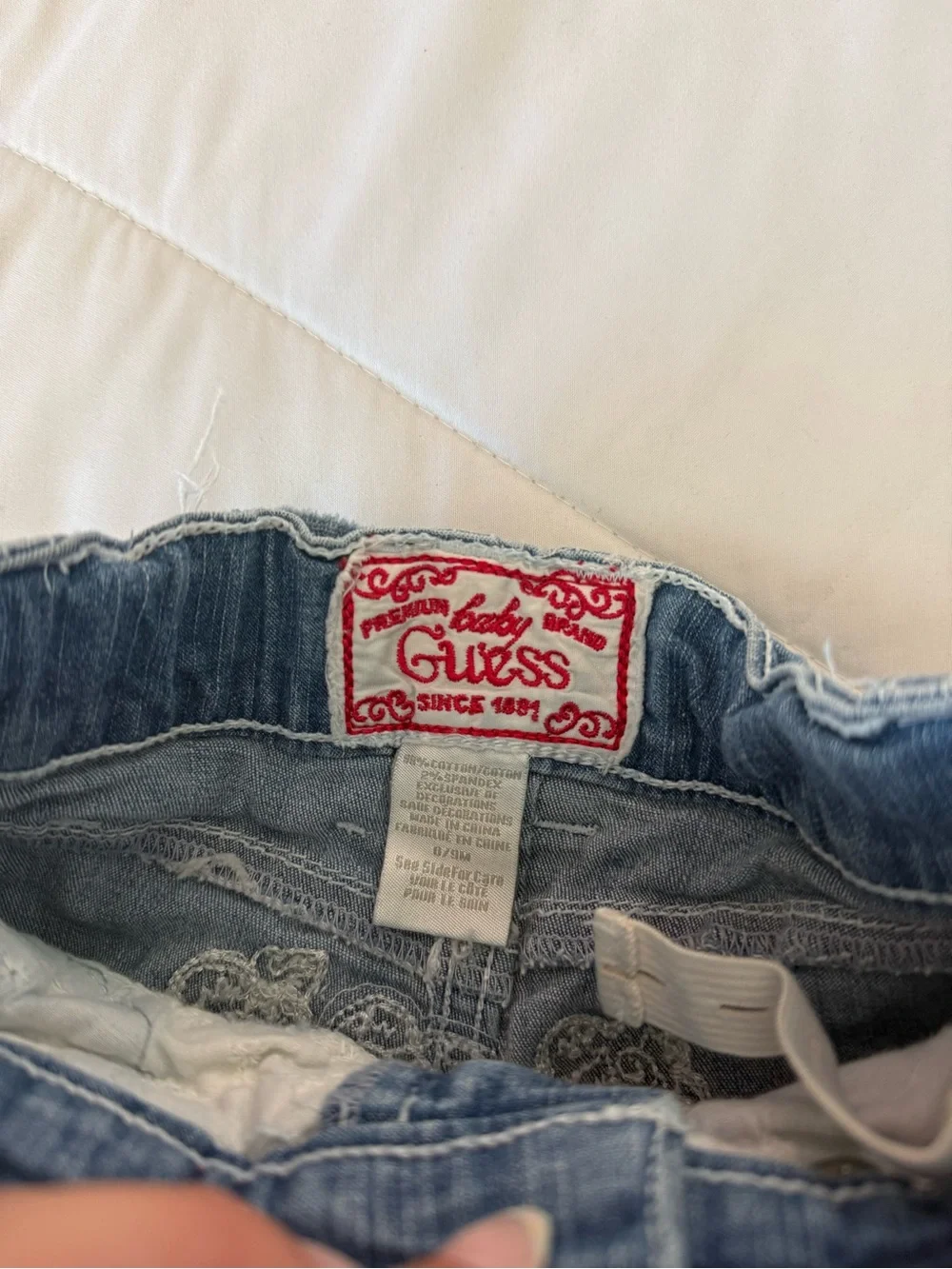 Vintage Guess Blue Denim Jeans with Cream Tie and Red Waist Accents
